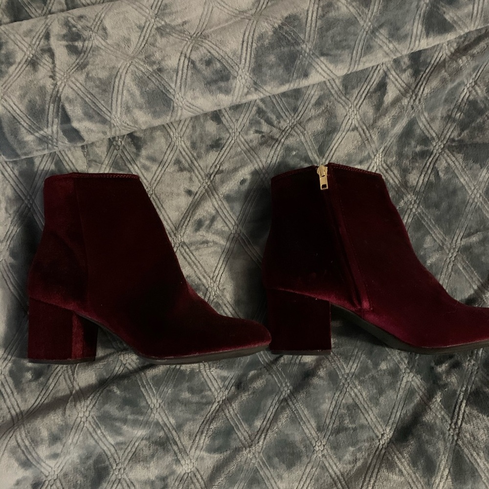 Women’s dark red velvet booties.